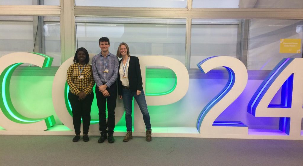 COP24 - some of the Grantham Scholars posing in front of the massive COP logo: what's it like at COP?