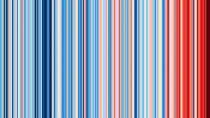 One of the iconic graphs shaping the climate conversation. The latest 'Warming Stripes' graph, colour coded with red and blue stripes to show the average temperature for a single year compared to the relative average temperature. The frequency and intensity of the red stripes increases to the right of the graph, highlighting how quickly our planet is warming.