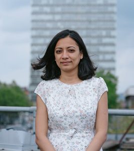 Photo of Reena Sayani an official COP26 observer in front of the Arts Tower in Sheffield.